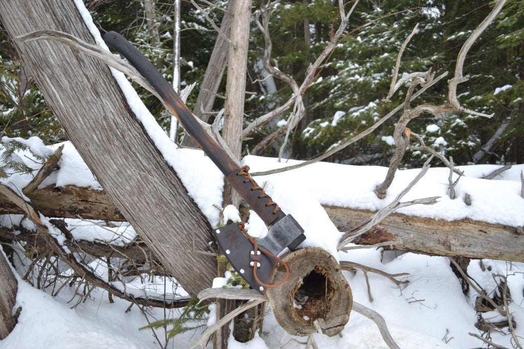 Jordan Jonas collaboration Moose bushcraft axe showing hand-forged steel head and natural hickory handle