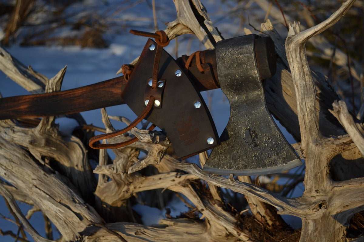 Jordan Jonas collaboration Moose bushcraft axe showing hand-forged steel head and natural hickory handle