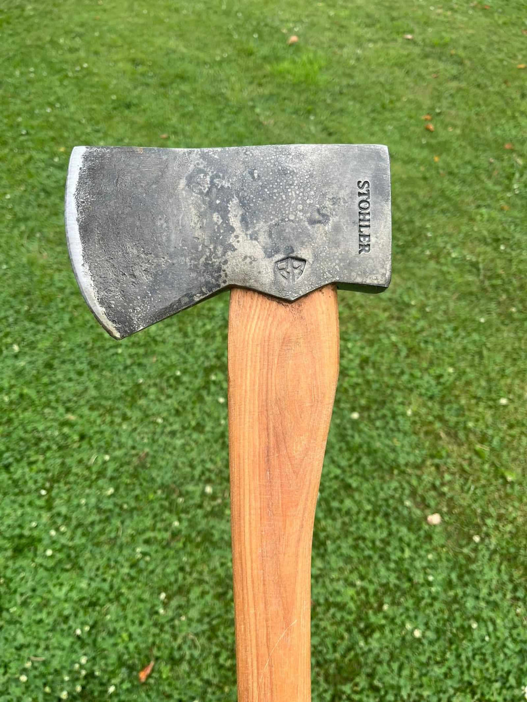 STOHLER axe historical recreation wood handle grass background Canada Broad River Forge