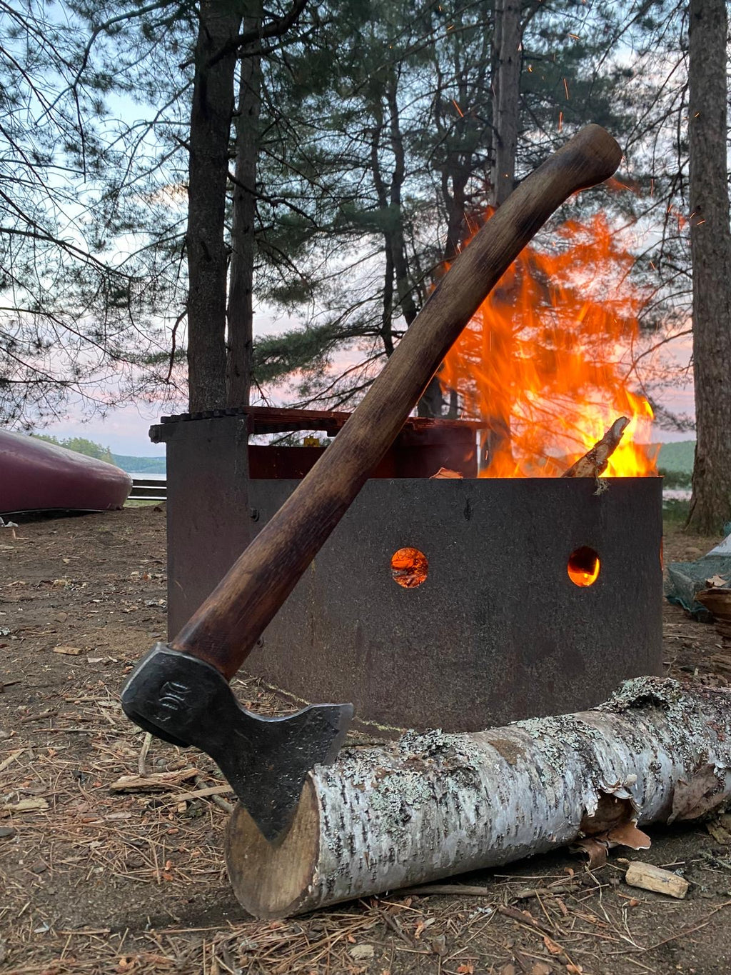 Taiga Wolverine portable bushcraft axe with canoe showing packable design for backcountry travel